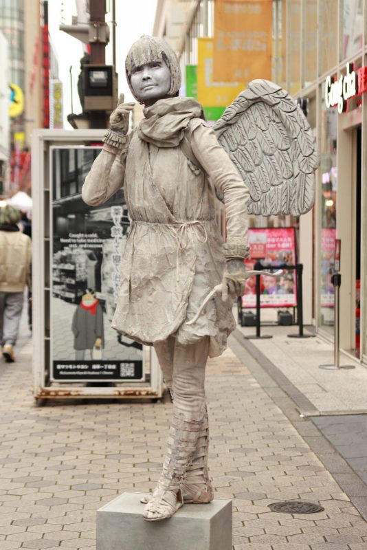 “Living statue”
